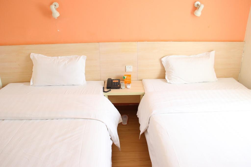 7Days Inn Dalian Gangwan Square Station Port חדר תמונה