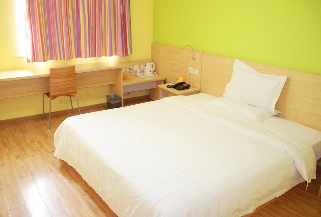 7Days Inn Dalian Gangwan Square Station Port חדר תמונה
